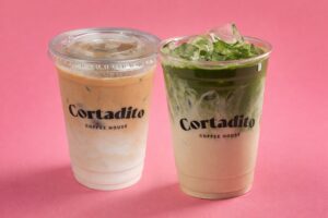 Iced Latte and Iced Matcha cups side by side at Cortadito, representing the emerging 2026 coffee and matcha trends in Miami